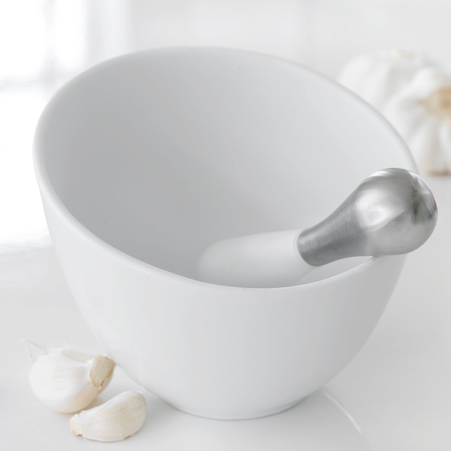 Morter i porcelæn og rustfri stål